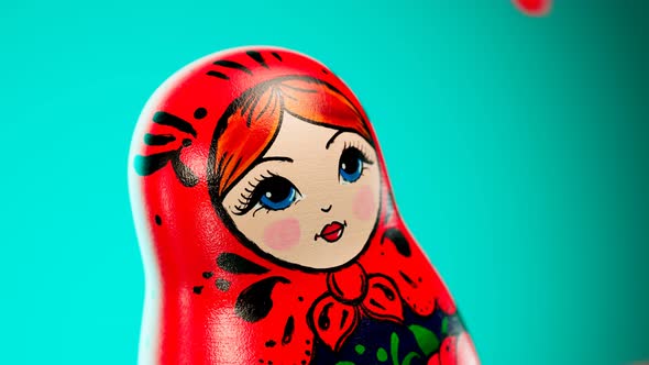 Babushka is breaking and falling apart and then we can see the smaller one. alt