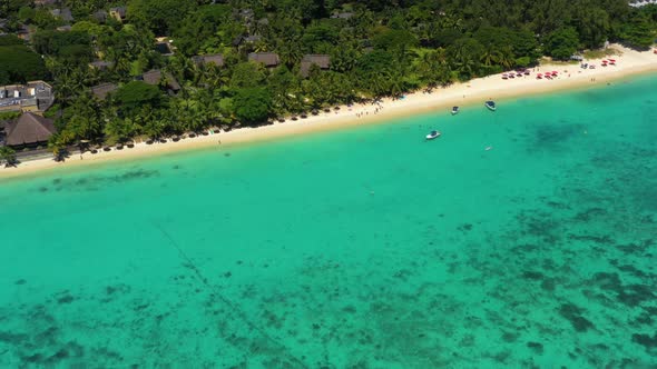 Flying on the Coast Line of the Ocean on the Drone. Amazing Trou aux Biches, Mauritius alt