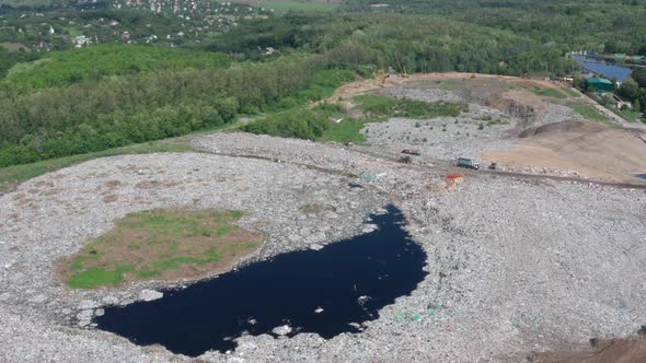 Aerial View of Toxic Lake in Rural Garbage Dump alt