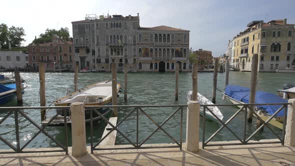 Boats anchored across Palazzo Da Mula Morosini