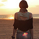 Girl is Walking on the Beach at Sunset - VideoHive Item for Sale