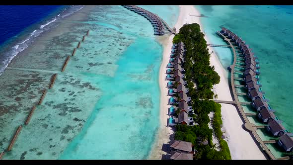 Aerial drone seascape of luxury lagoon beach journey by turquoise ocean and white sandy background o alt
