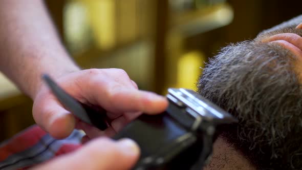 Bearded Man Getting Beard Haircut and Shaved