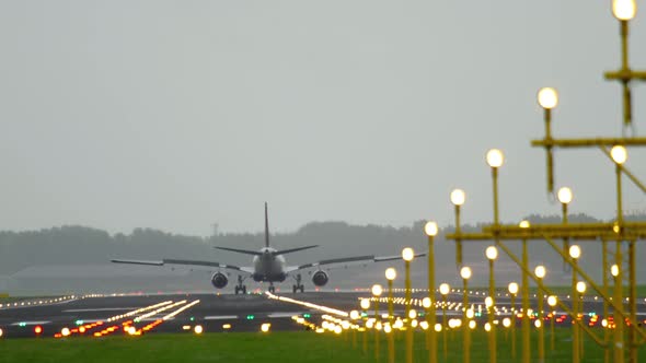 Airplane Landing at the Early Morning