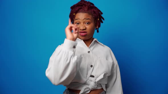 Dissatisfied Afro American Woman Showing Her Refusal Denies Something Against Blue Background