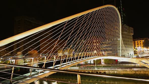 Great Number of People Passing From One Bank to Another Through Zubizuri Bridge alt