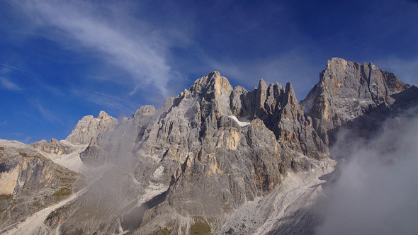 Dolomite Peaks In Clouds