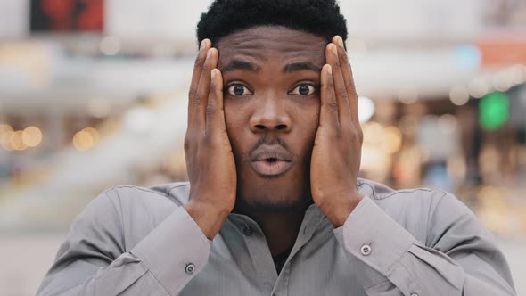 Closeup Male Portrait Young Surprised Stunned Excited Shocked Serious African American Man Holding alt
