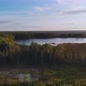 Takeoff of the Drone Over the Lake of Taiga Siberian Swamps From a Bird&#39;s Eye View - VideoHive Item for Sale