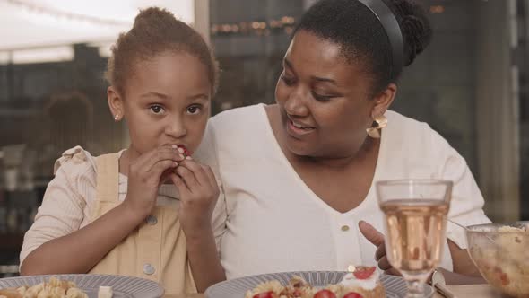 Cute Girl Eating Strawberry alt