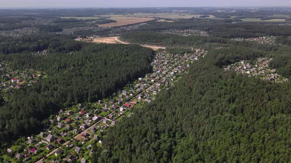 Bird'seye View of a Residential Village in the Middle of the Forest