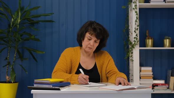 Middle Aged Woman Study at Home alt
