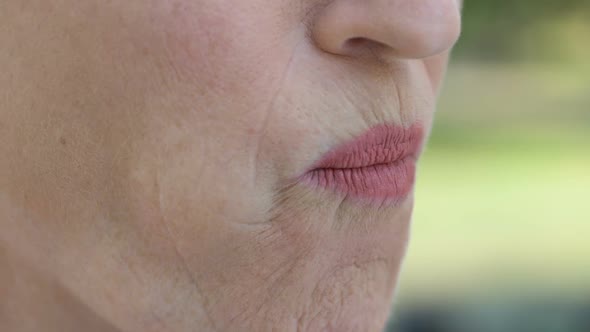 Retired Lady Feeling Discomfort in Mouth, Inflammation of Gums, Periodontitis alt