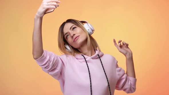 Blonde Woman Dance with Headphones