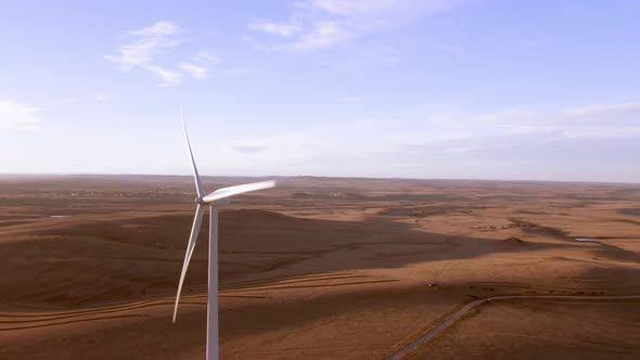 Aerial shots of a wind farm near Calhan in Colorado around sunset alt