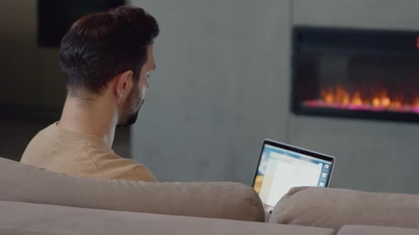 Young attractive man received good news on the internet alt