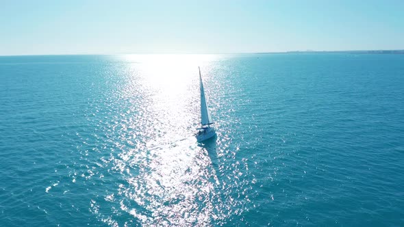 Aerial View. Traditional Yacht Sailing Across Sea. alt
