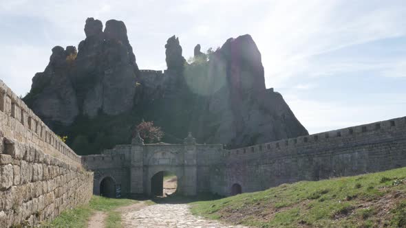 Old  sandstone and conglomerate formations slow tilt 4K 2160p 30fps UltraHD footage - Rocks near tow alt