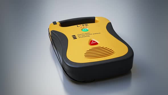 An automatic electronic defibrillator. which can save live using electric shock. alt