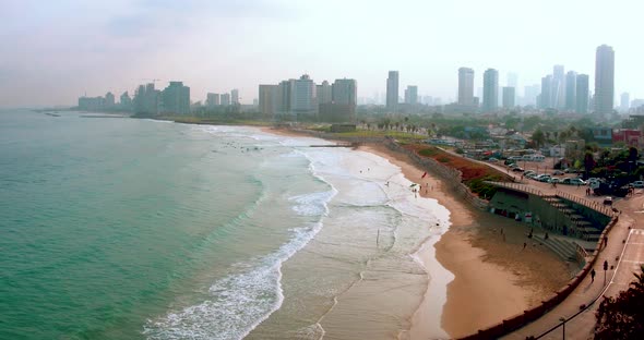 Surfers At Tel Aviv Beach Coastline Early Morning