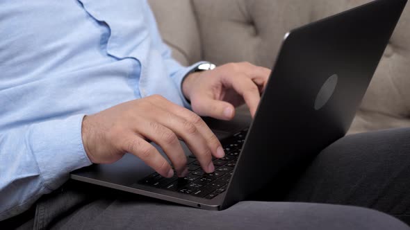 Close Up Hand Man Stock Trader Broker Businessman Typing Text on Laptop Keyboard alt