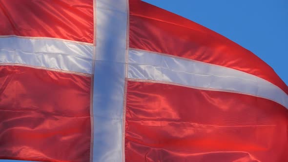 The national danish flag waving in the wind. alt
