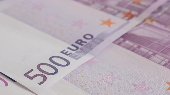 Background of red 500 euro banknotes in a row slow tilt 4K 2160p 30fps UltraHD    footage - EU paper alt