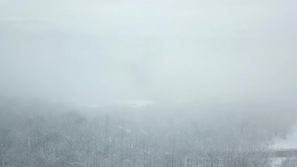 Drones Eye View  Winding Road From the High Mountain Pass in Winter alt