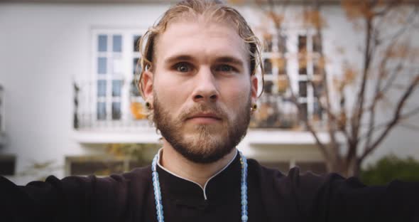 Man Performing Martial Arts Bow To Camera alt