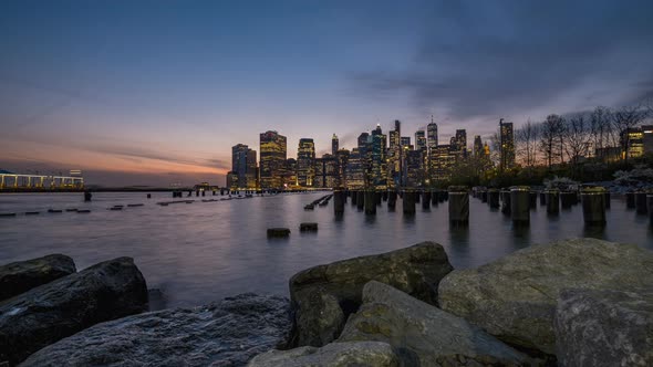 Day to Night Motion Timelapse Sunset Over East River Lower Manhattan Skyline View From Brooklyn Brid alt