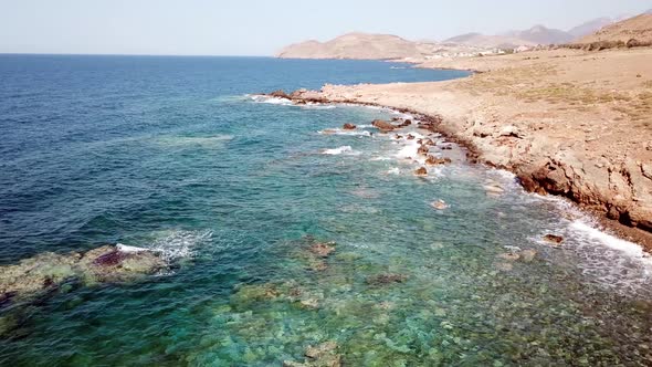 Aerial View Flying Along a Rocky Goast Greece Crete