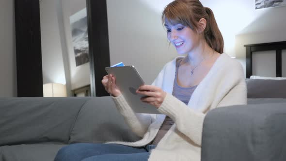 Online Shopping on Tablet PC by Sitting Woman alt