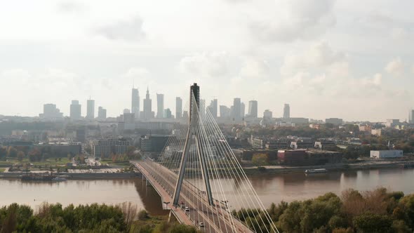 Slide and Pan Shot of Bridge Over Vistula River with Reversed Y Shape Pillar alt