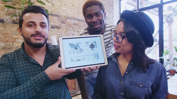 Mixed-Raced Team of Designers Presenting Interior Project via Web Call