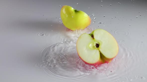 Apple Falls on a Thin Layer of Water