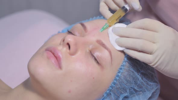 Woman on the Procedure of Mesotherapy Injection