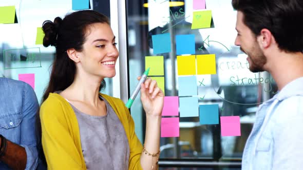 Executives interacting with each other during meeting alt