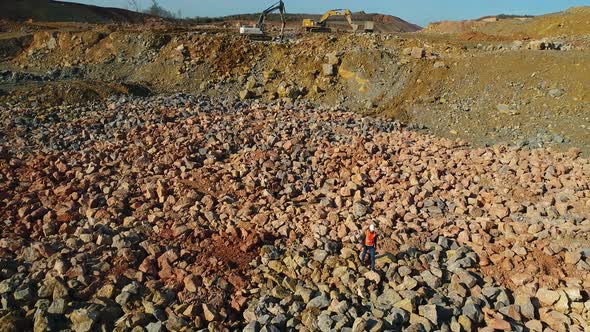 Engineer Walking on Construction Site alt