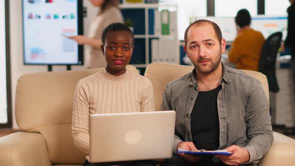 POV of Diverse Colleagues Discussing About Financial Strategy During Video Meeting alt