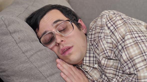 Sleeping Nerd on the Sofa alt