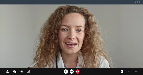 Caucasian woman doctor talking with patient online via video call