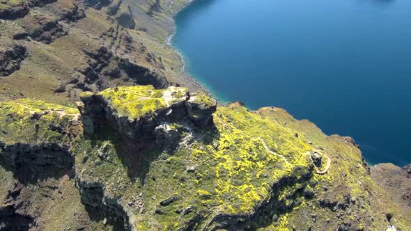 Aerial view from above of Skaros Rock at Santorini island
