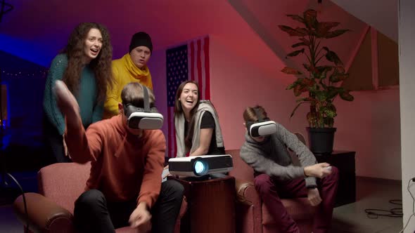 Group of Young Friends Playing Virtual Videogame