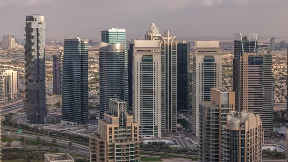 Dubai Marina Skyscrapers and Jumeirah Lake Towers View From the Top Aerial Timelapse in the United alt