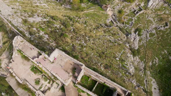 Aerial Shot of the Fortress St John San Giovanni Over the Old Town of Kotor the Famous Tourist Spot alt