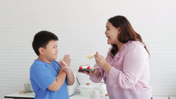 Fat Son forbids Fat Mom from eating ckae. junk food, unhealthy