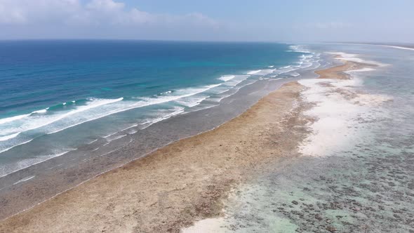 Ocean Coastline and Barrier Reef at Low Tide Zanzibar Matemwe Aerial View alt