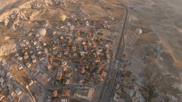 Cappadocia Aerial Shot of Rock Chimneys and Uchisar Castle in Goreme Turkey