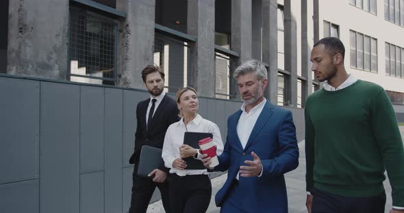 Smiling Men And Women In Morning On Street alt