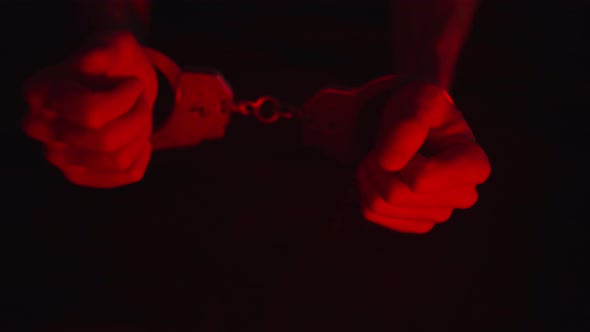 The Police Take the Handcuffed Prisoner to the Prison